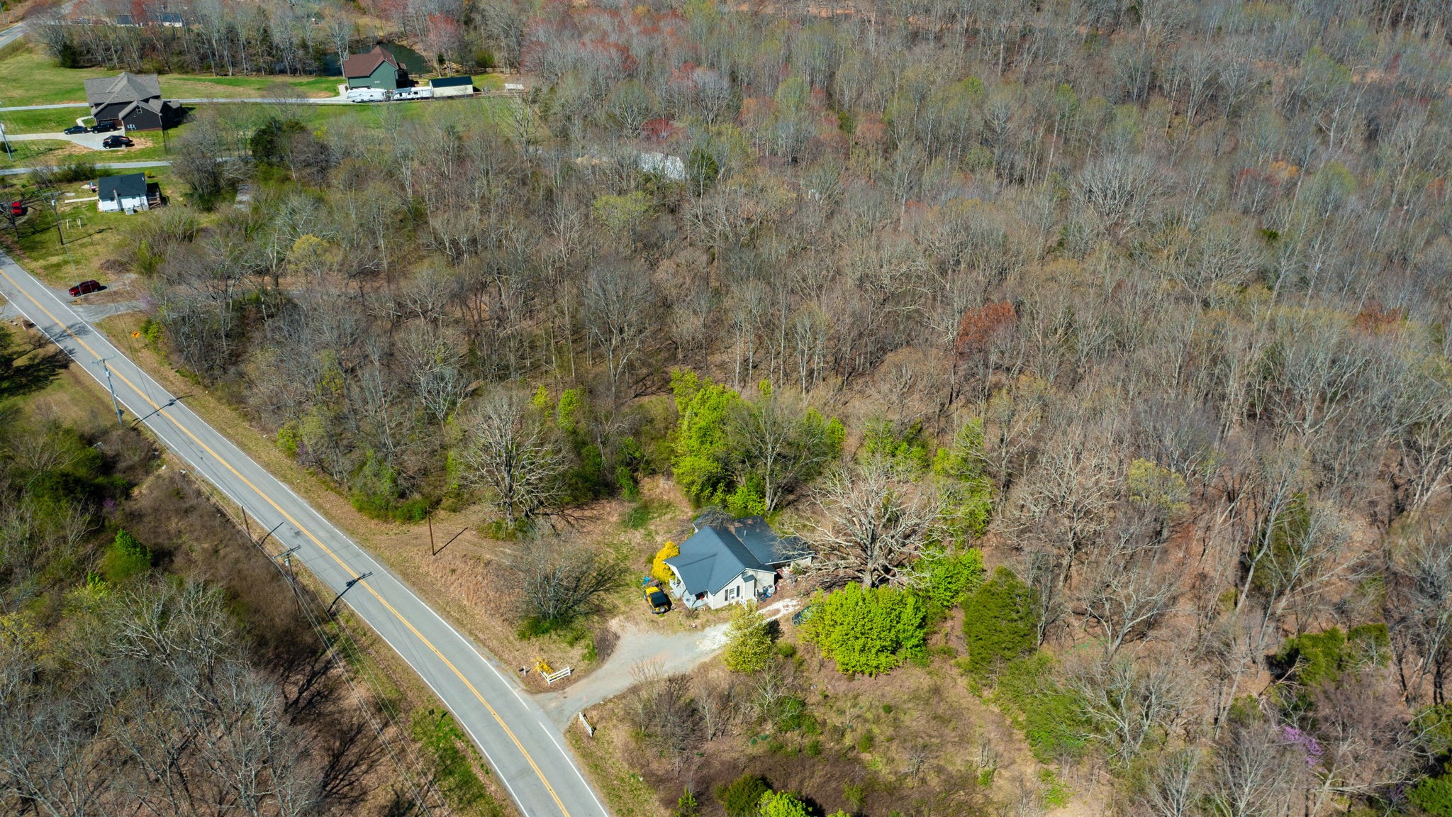 1461 Southside Road Southside, TN 37171 - Photo 19 of 28 a view of a yard with wooden fence