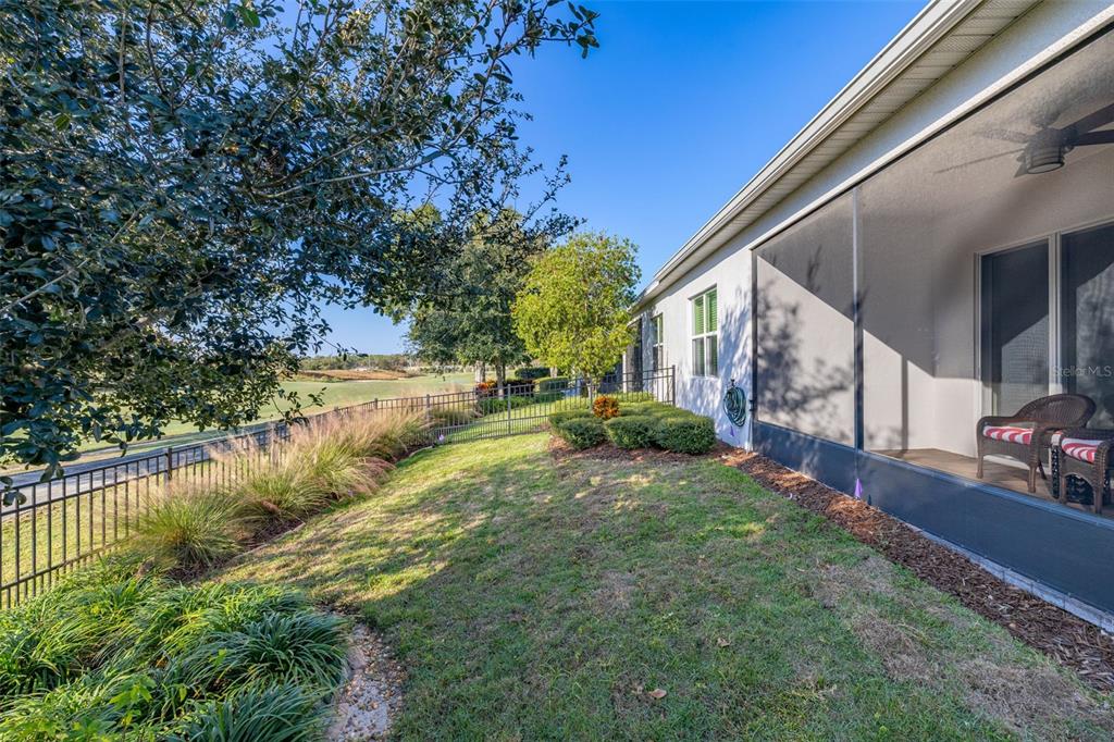 1855 Flora Pass Place Kissimmee, FL 34747 - Photo 12 of 41 a view of backyard with green space
