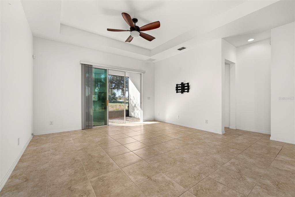1855 Flora Pass Place Kissimmee, FL 34747 - Photo 16 of 41 an empty room with ceiling fan and window