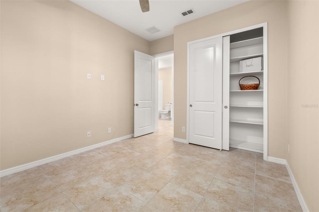 1855 Flora Pass Place Kissimmee, FL 34747 - Photo 27 of 41 a view of an empty room and closet area