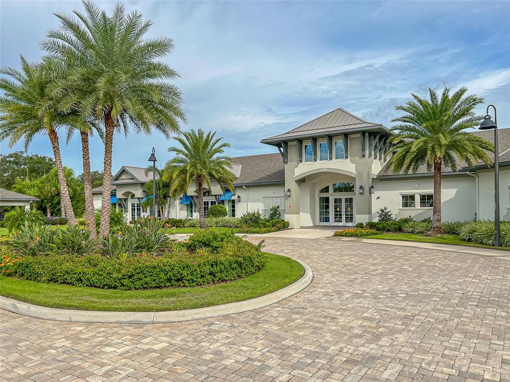 1855 Flora Pass Place Kissimmee, FL 34747 - Photo 32 of 41 a front view of house with yard and green space