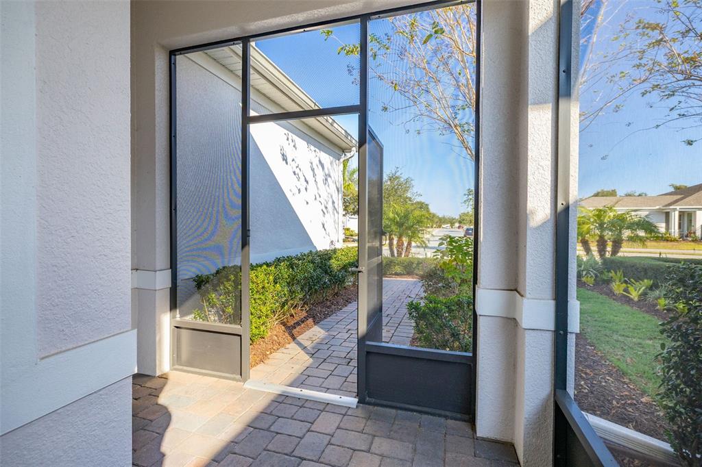1855 Flora Pass Place Kissimmee, FL 34747 - Photo 4 of 41 a view of a door and outdoor space