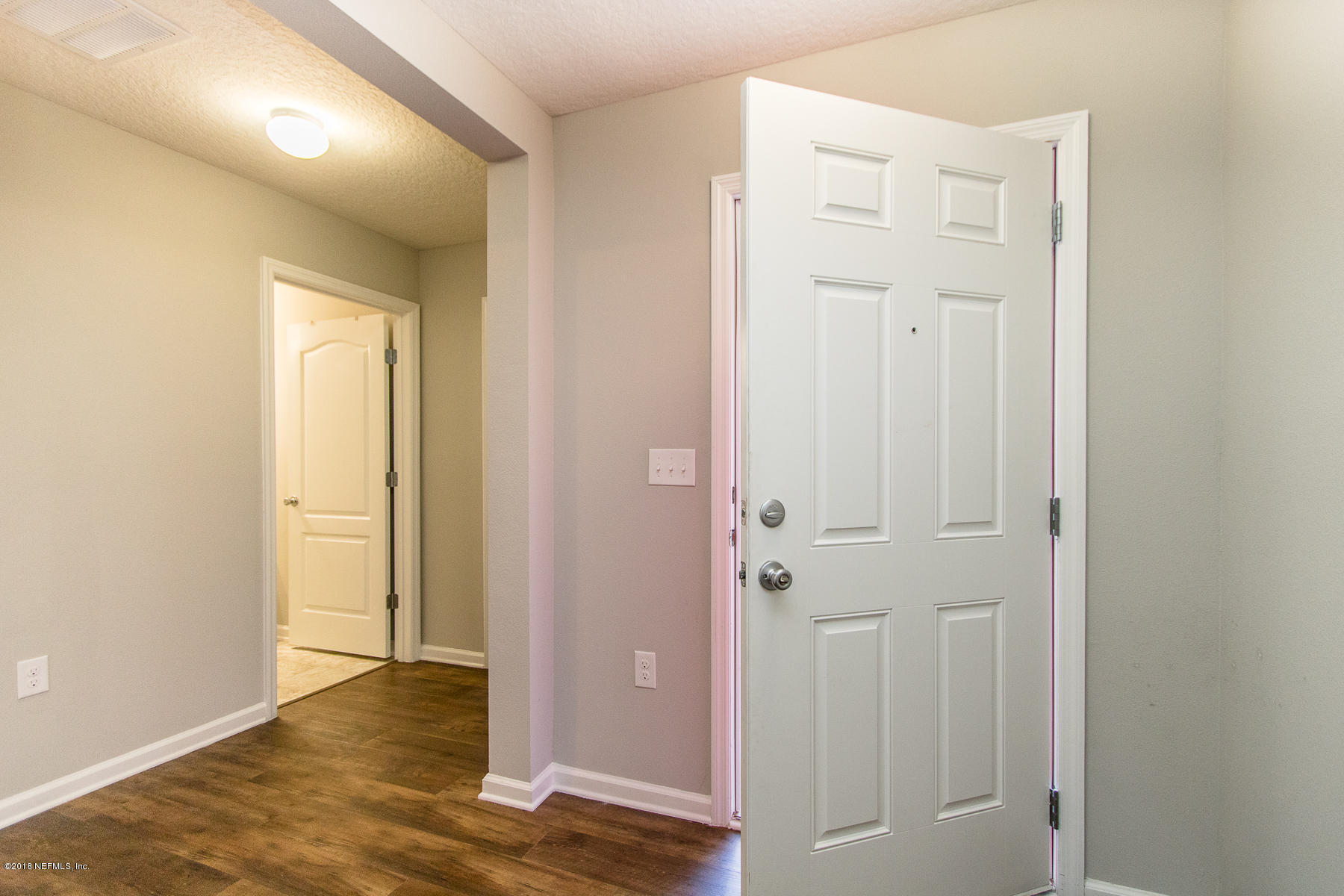 393 Hepburn Road Orange Park, FL 32065 - Photo 5 of 34 an empty room with wooden floor