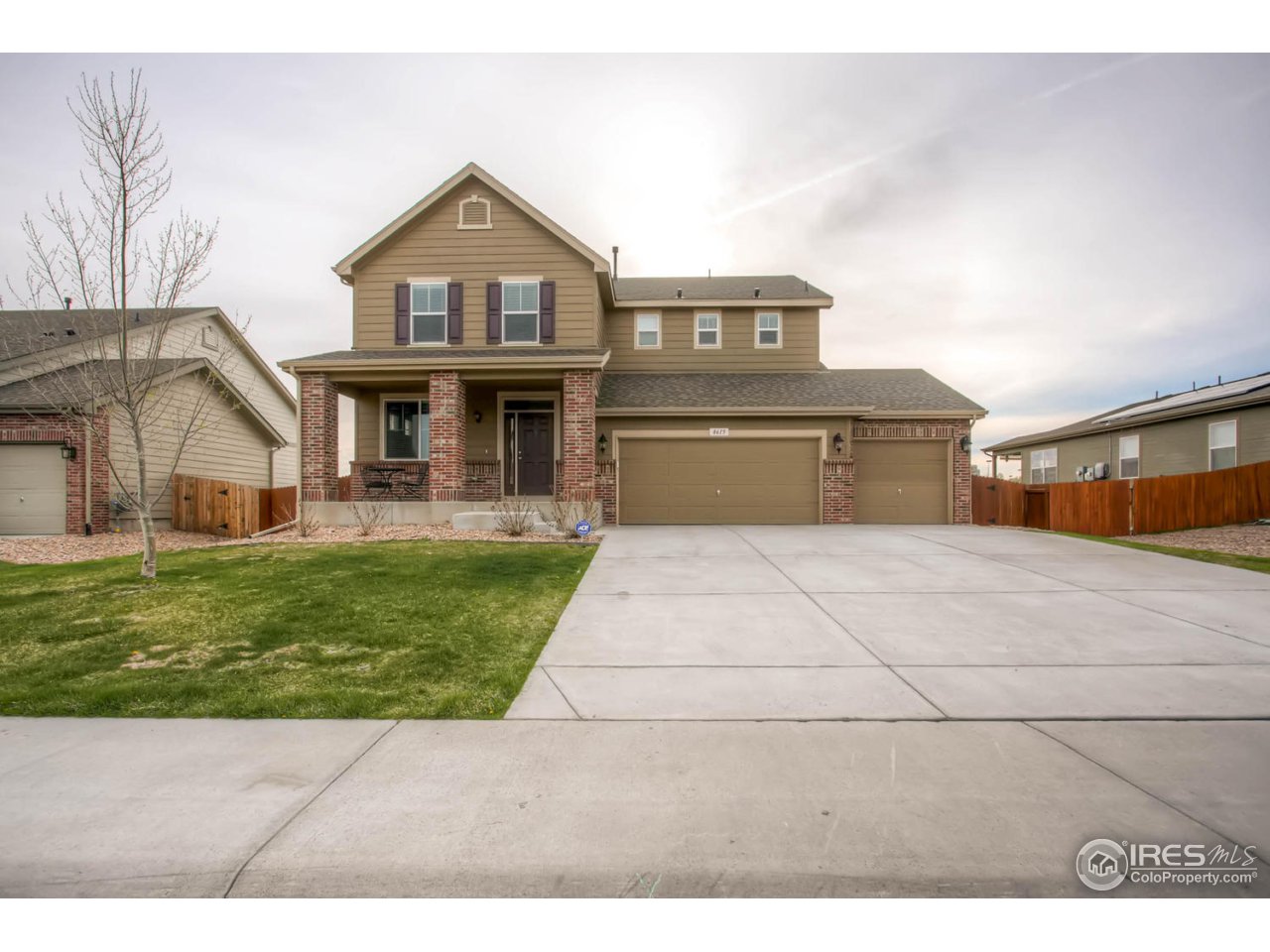 8615 Raspberry Drive Frederick, CO 80504 - Photo 1 of 28 a front view of a house with garden