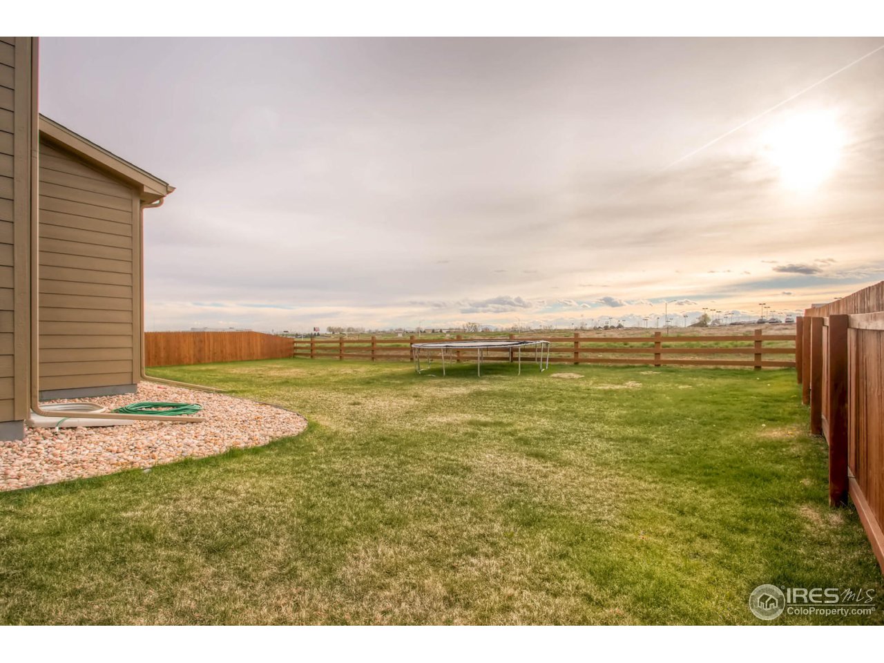 8615 Raspberry Drive Frederick, CO 80504 - Photo 26 of 28 a view of an ocean and beach