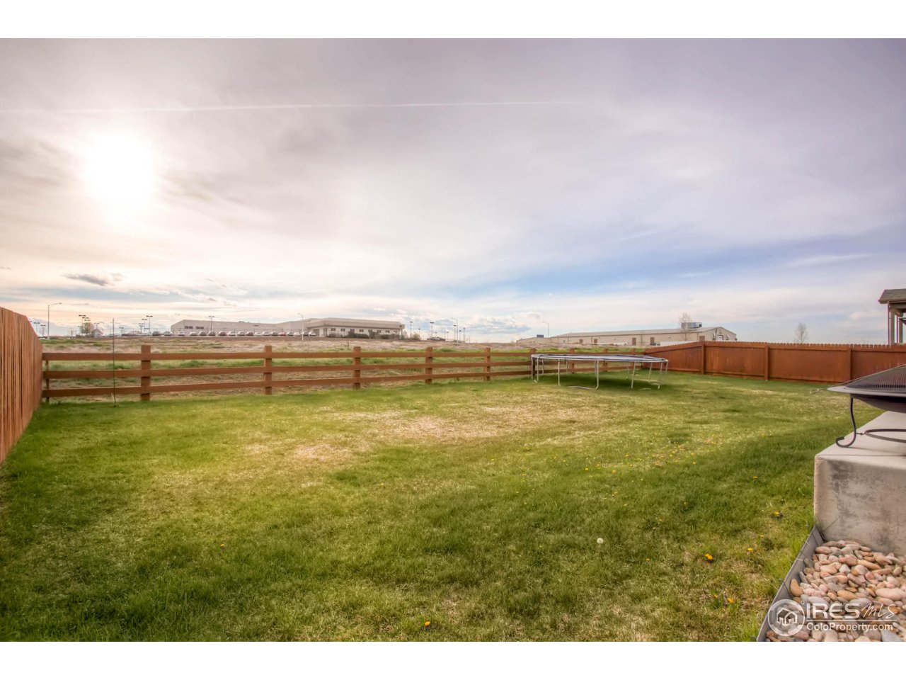 8615 Raspberry Drive Frederick, CO 80504 - Photo 27 of 28 a view of an ocean and beach