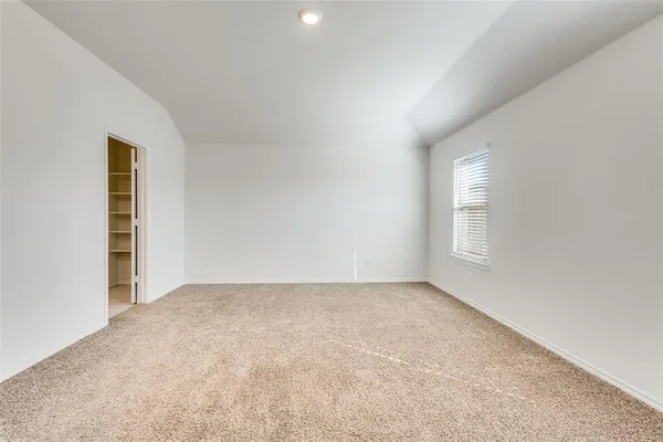 a bathroom with a double vanity sink a mirror and a shower