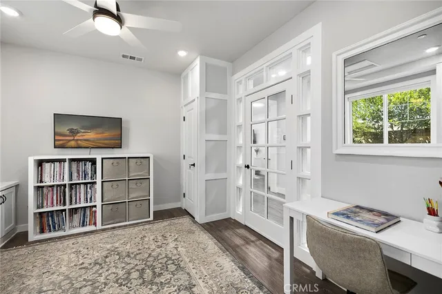 a spacious bathroom with a granite countertop sink mirror and shower