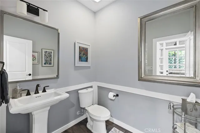 a view of a house with swimming pool and sitting area