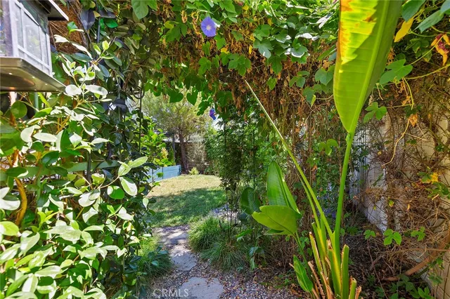 a view of a patio with swimming pool