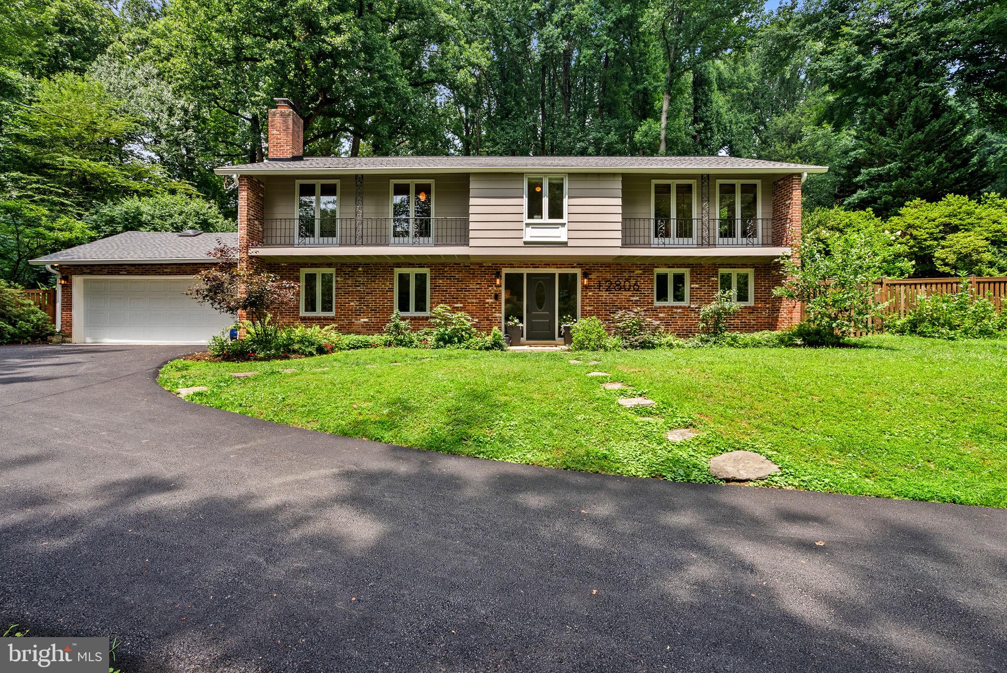 12806 Gaffney Road Silver Spring, MD 20904 - Photo 5 of 57 a front view of house with yard and green space