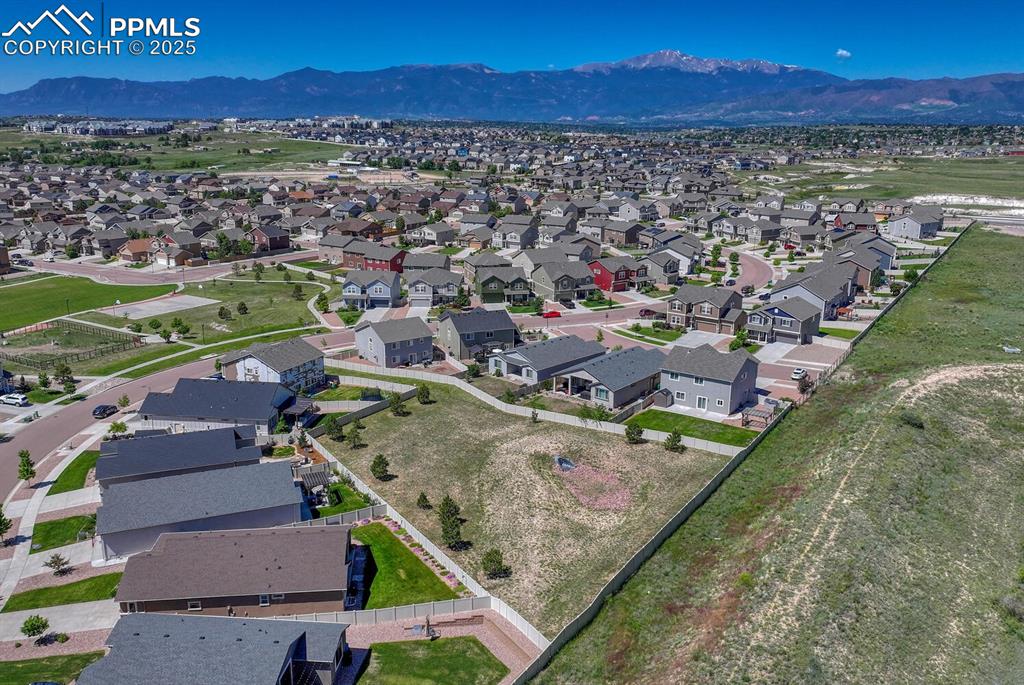 8437 Salt Brush Road Colorado Springs, CO 80908 - Photo 39 of 45 Elevate your perspective with this captivating aerial view, highlighting the property's prime location within a desirable suburban area, full of promise and potential.