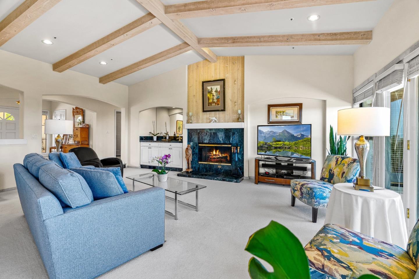 25611 Whip Road Monterey, CA 93940 - Photo 17 of 29 a living room with fireplace furniture and a flat screen tv