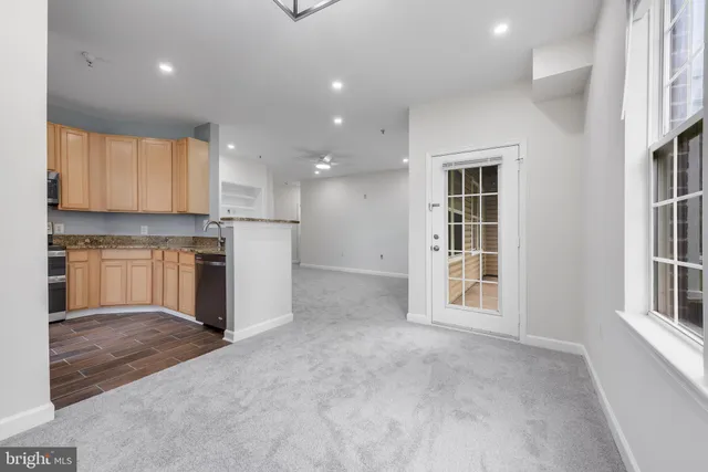 a view of a car parked in front of a building