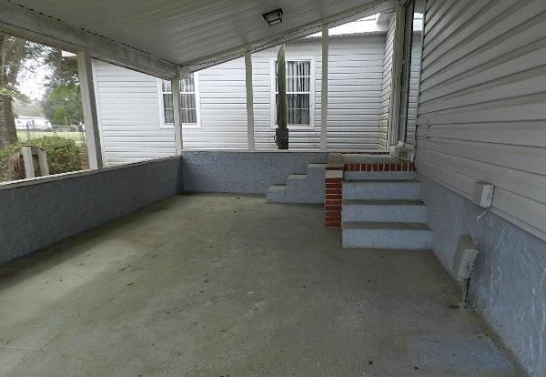 1121 Ridge Road Ridgeville, SC 29472 - Photo 5 of 12 porch