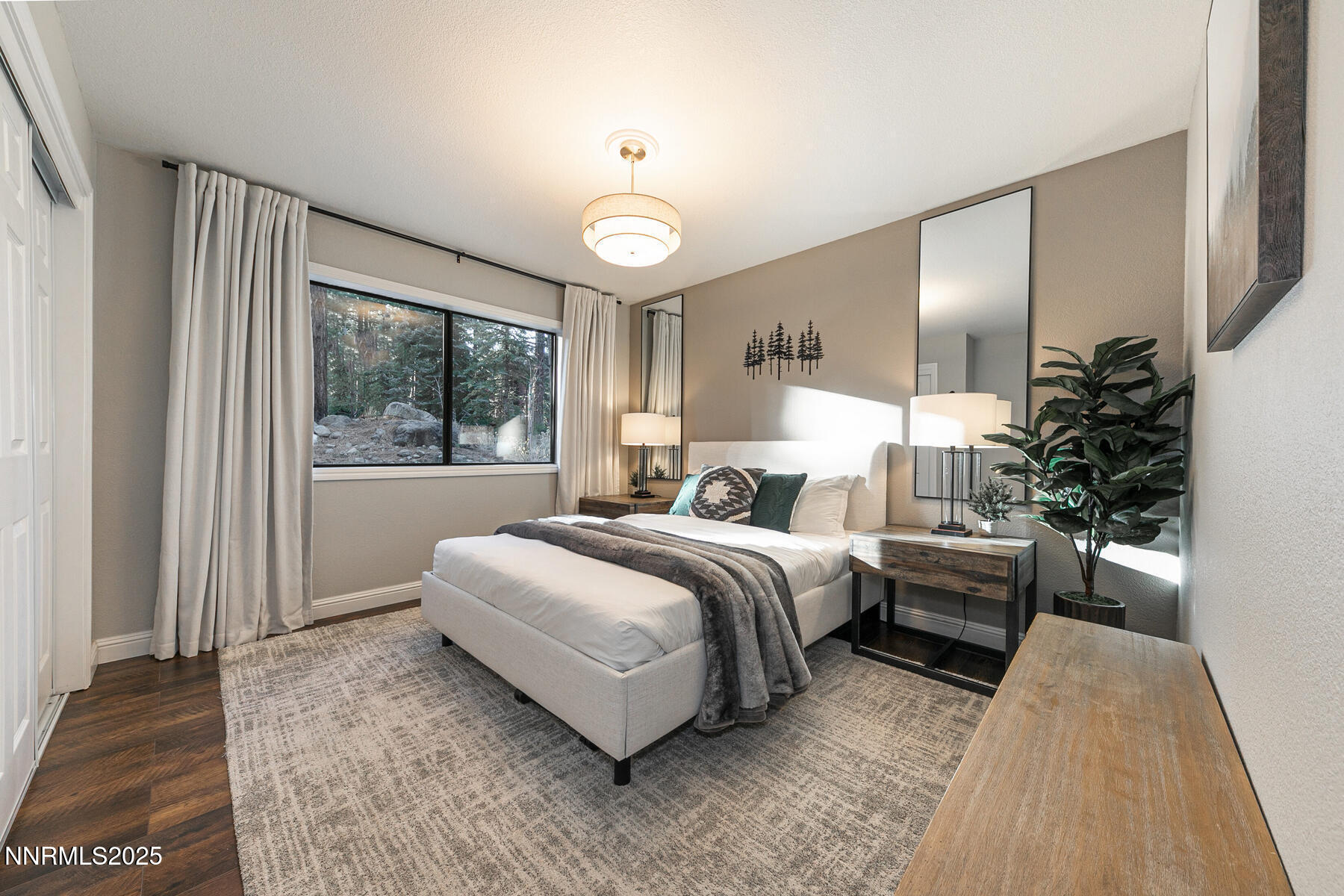 25 Winterberry Court Reno, NV 89511 - Photo 15 of 31 a bedroom with bed and a large window