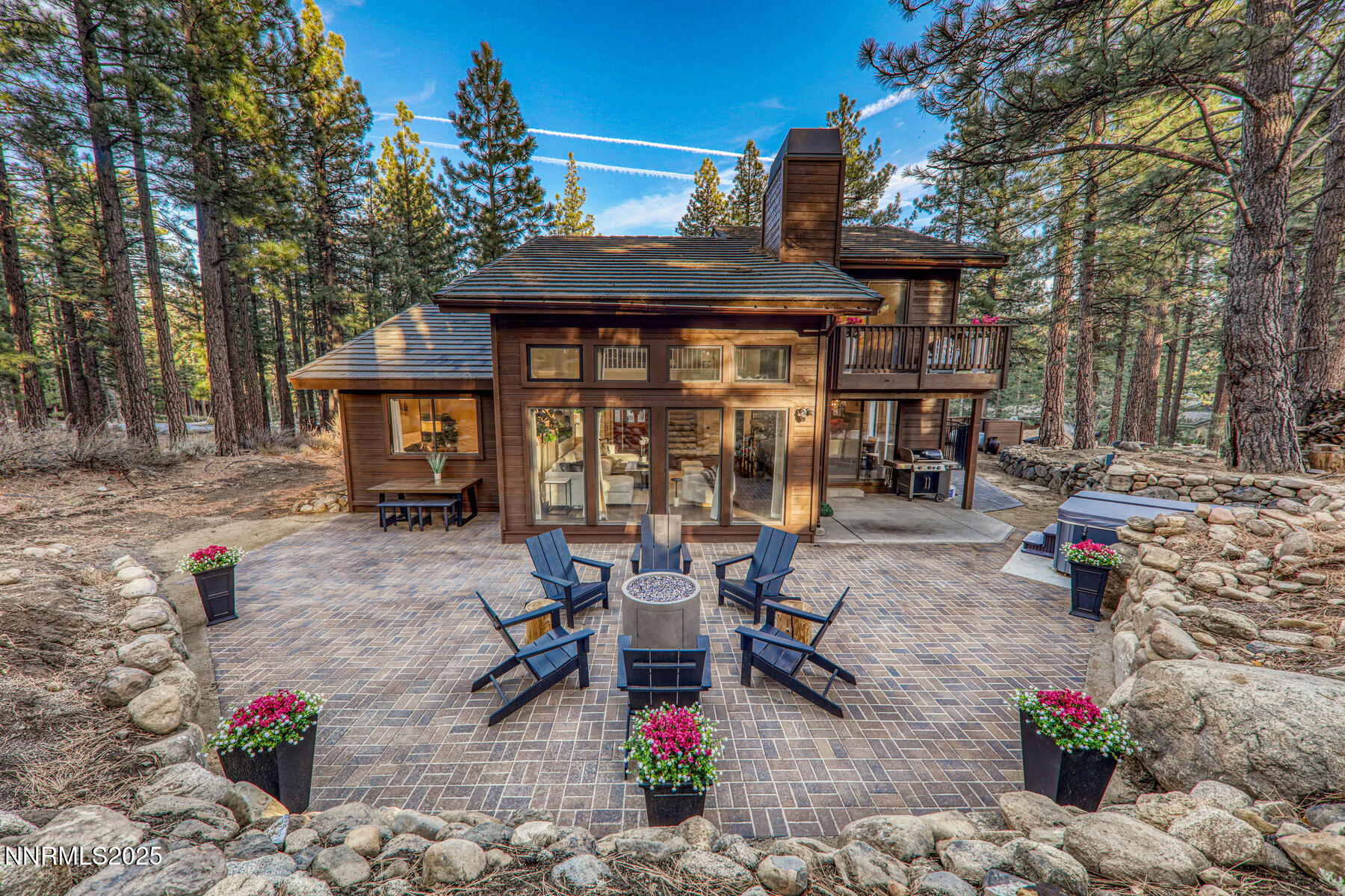 25 Winterberry Court Reno, NV 89511 - Photo 2 of 31 a view of a chairs and table in the patio in front of a house
