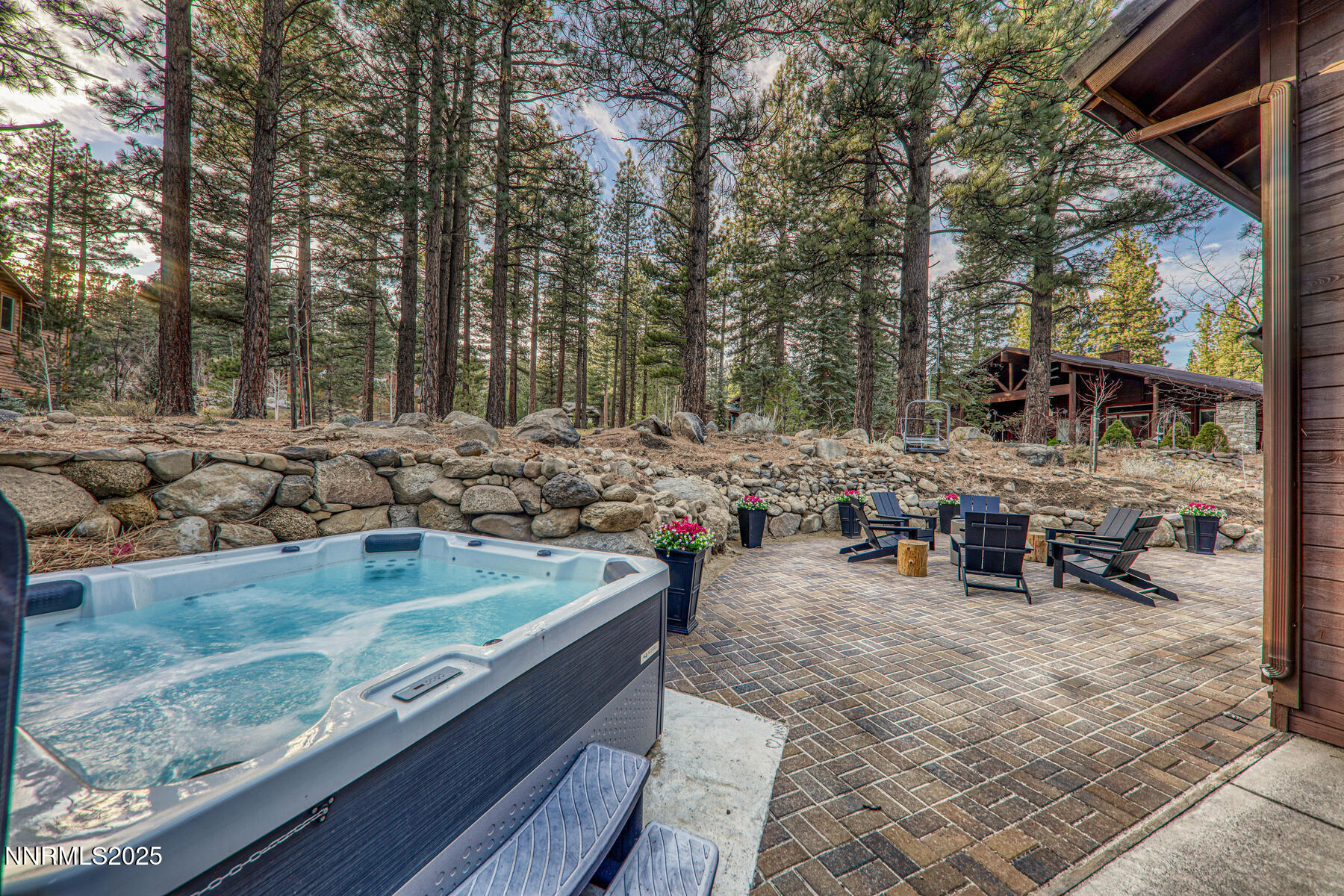 25 Winterberry Court Reno, NV 89511 - Photo 30 of 31 a view of a backyard with chairs and sitting area