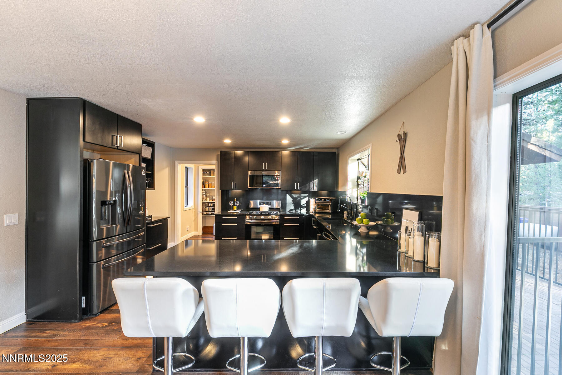 25 Winterberry Court Reno, NV 89511 - Photo 9 of 31 a view of a dining room with furniture