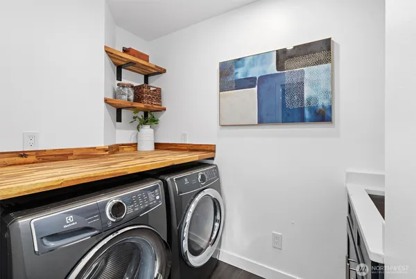 a utility room with dryer and washer