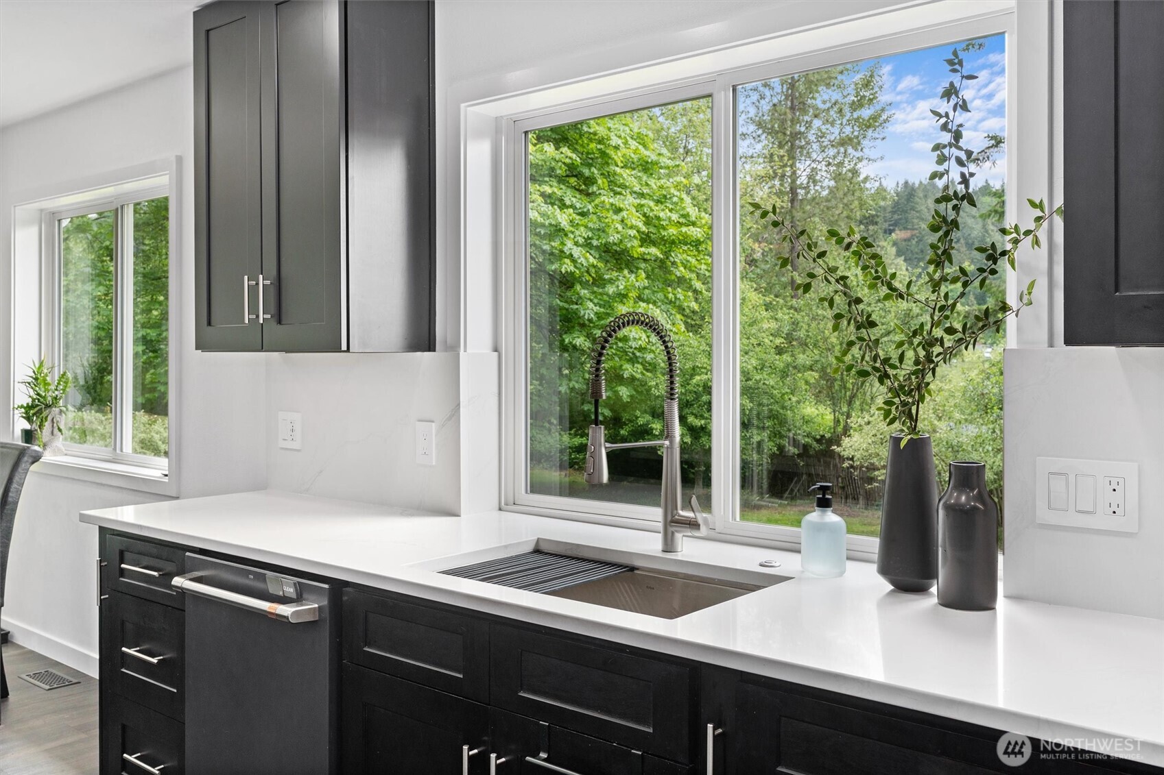 16100 Southeast 113th Place Renton, WA 98059 - Photo 19 of 40 a kitchen with a sink and large window