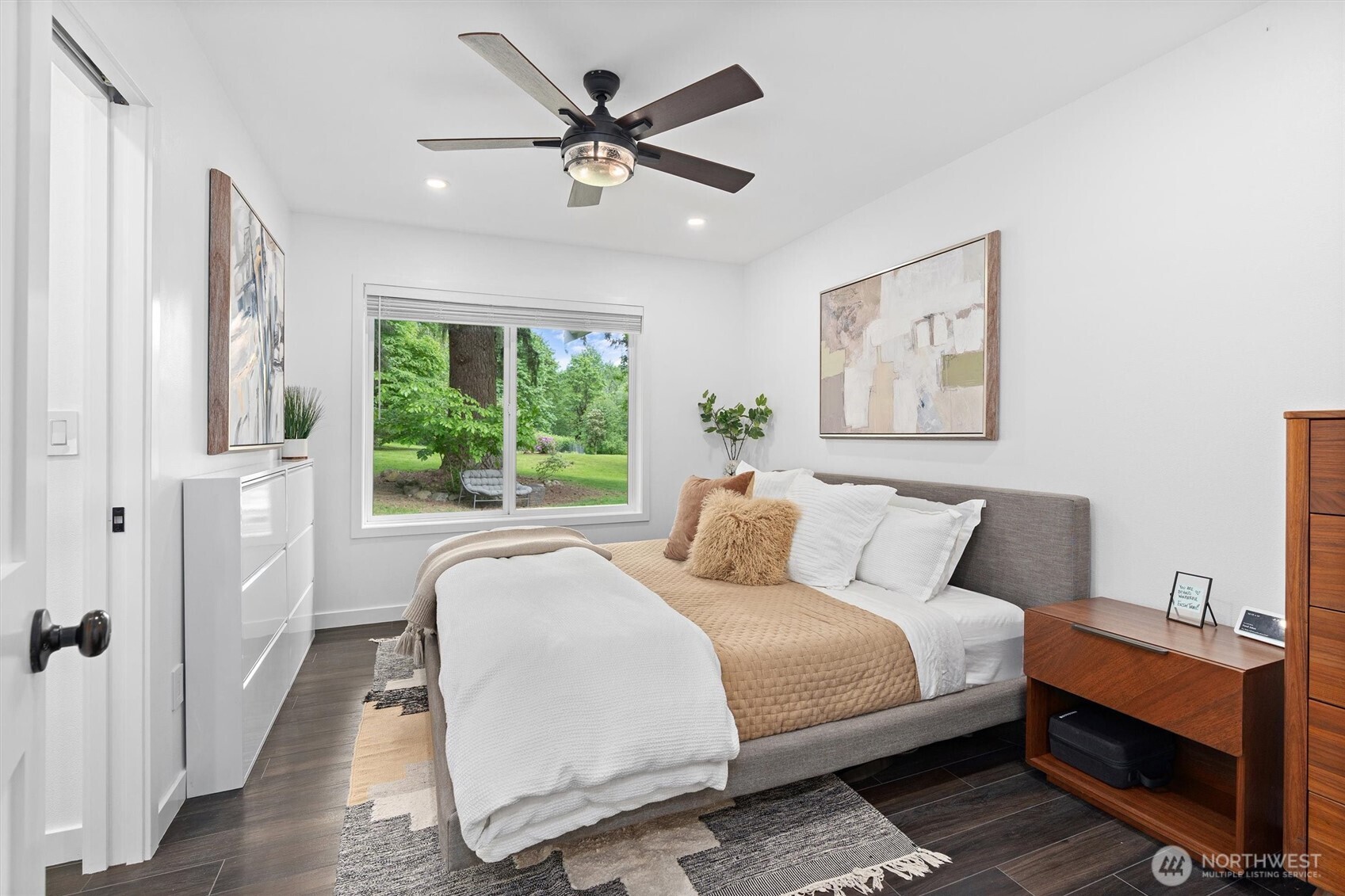 16100 Southeast 113th Place Renton, WA 98059 - Photo 21 of 40 a bedroom with a large bed and a window