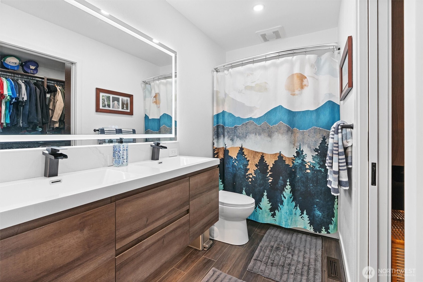 16100 Southeast 113th Place Renton, WA 98059 - Photo 24 of 40 a bathroom with a sink mirror and a toilet