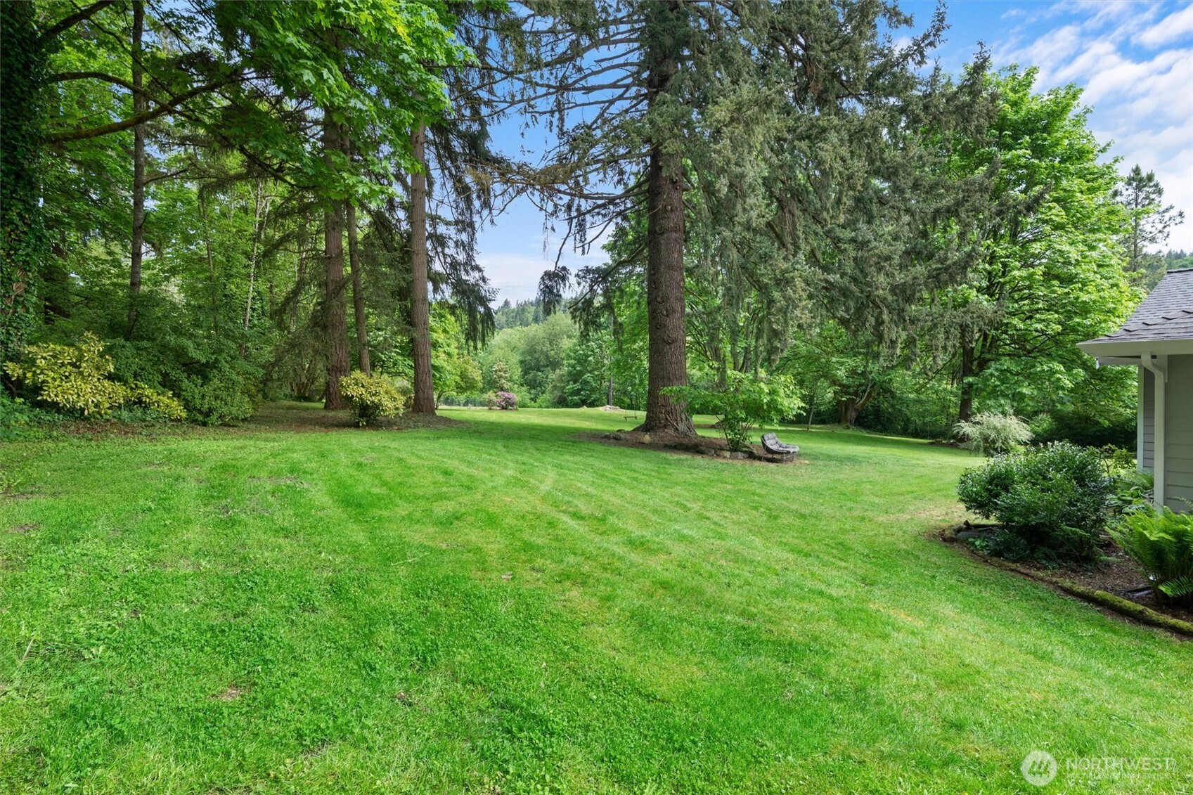 16100 Southeast 113th Place Renton, WA 98059 - Photo 30 of 40 a view of a backyard with a garden