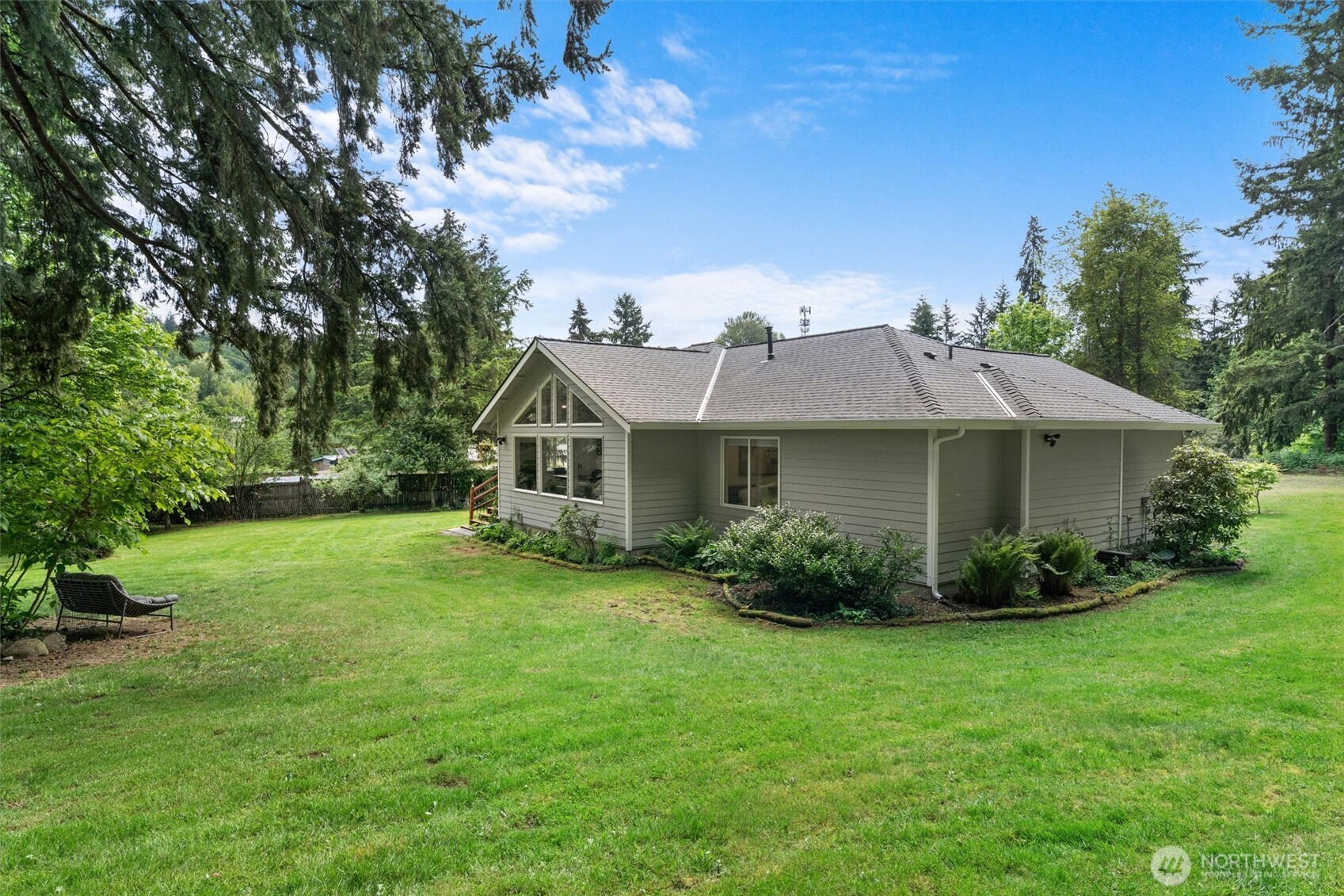 16100 Southeast 113th Place Renton, WA 98059 - Photo 31 of 40 a front view of a house with a garden
