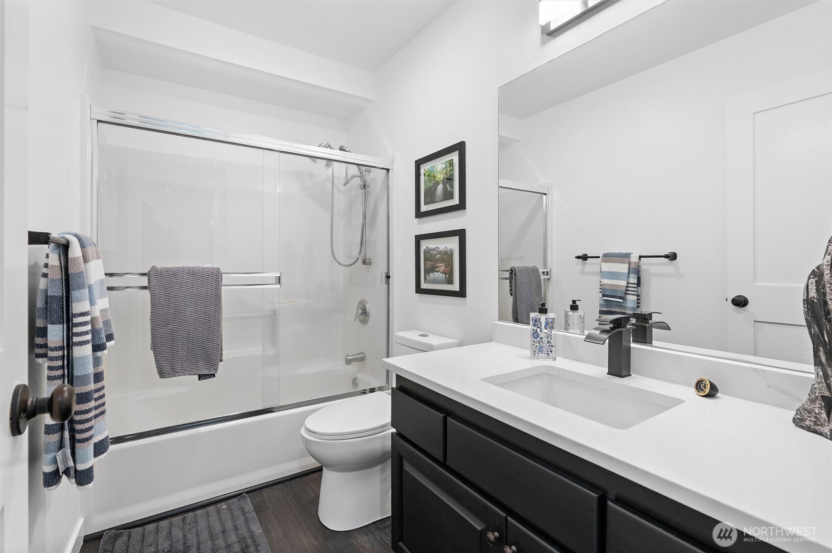 16100 Southeast 113th Place Renton, WA 98059 - Photo 31 of 40 a bathroom with a sink a toilet and shower