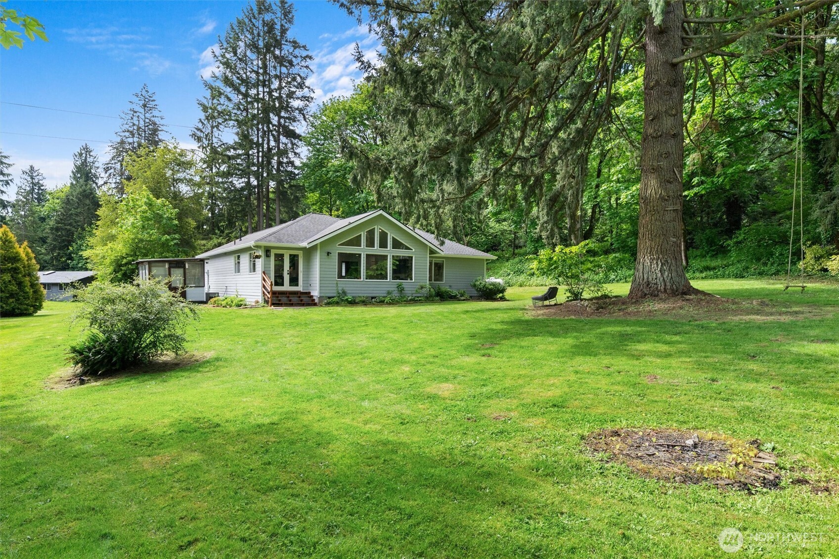 16100 Southeast 113th Place Renton, WA 98059 - Photo 32 of 40 a house view with garden space