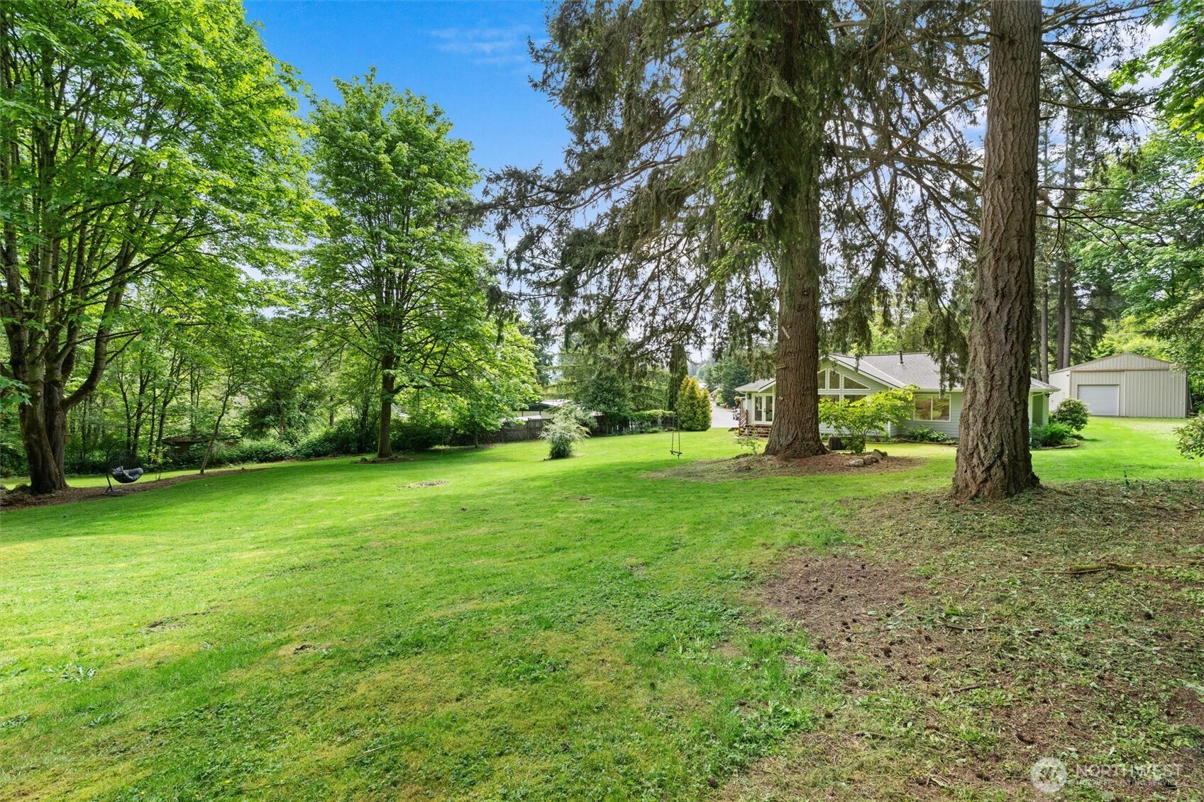 16100 Southeast 113th Place Renton, WA 98059 - Photo 33 of 40 a view of outdoor space with deck and yard
