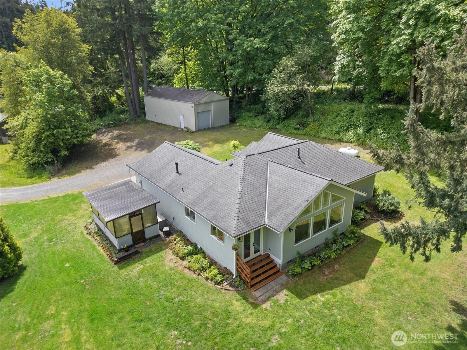 16100 Southeast 113th Place Renton, WA 98059 - Photo 4 of 40 an aerial view of a house with swimming pool
