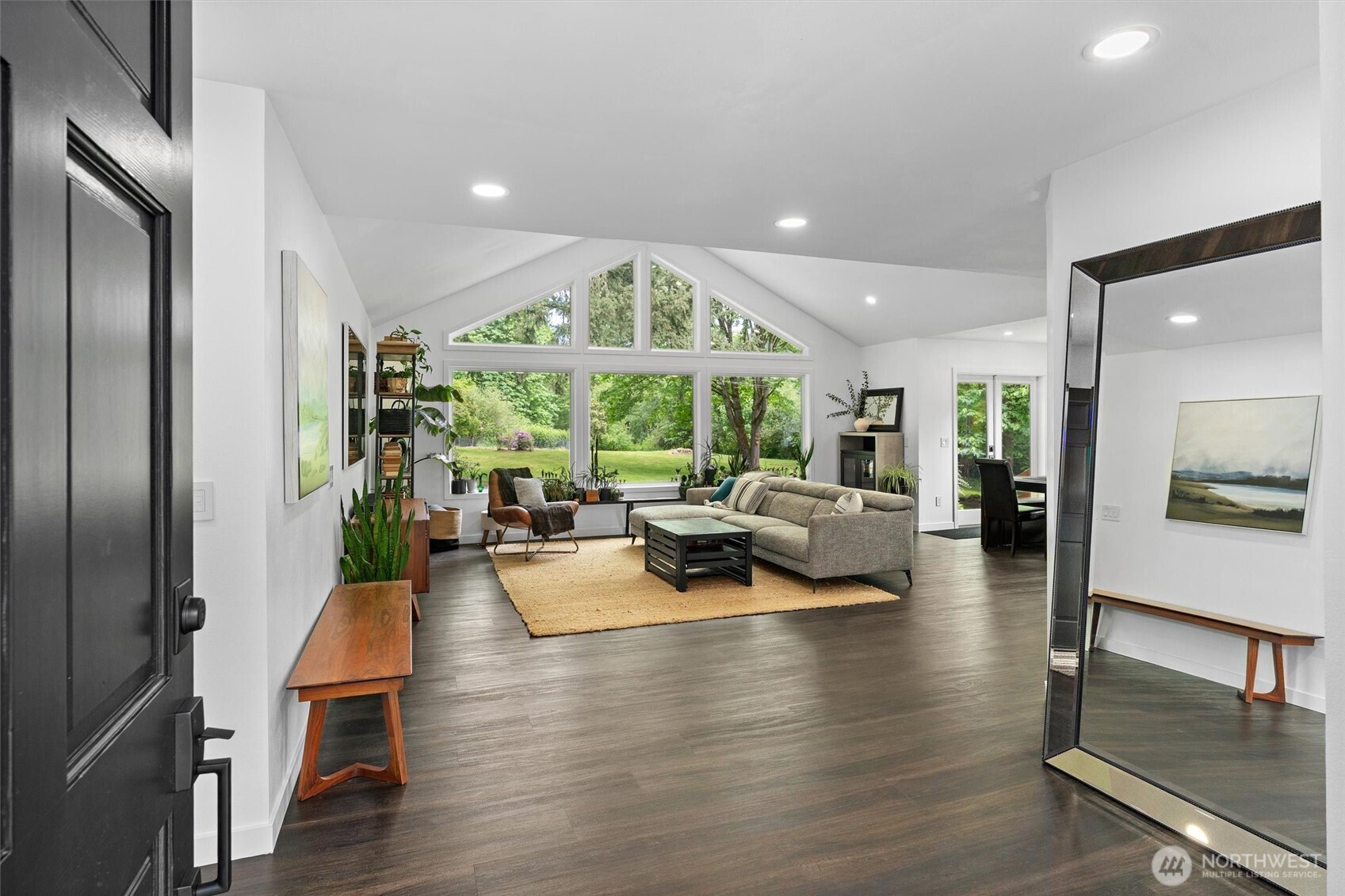 16100 Southeast 113th Place Renton, WA 98059 - Photo 5 of 40 a living room with fireplace furniture and a large window