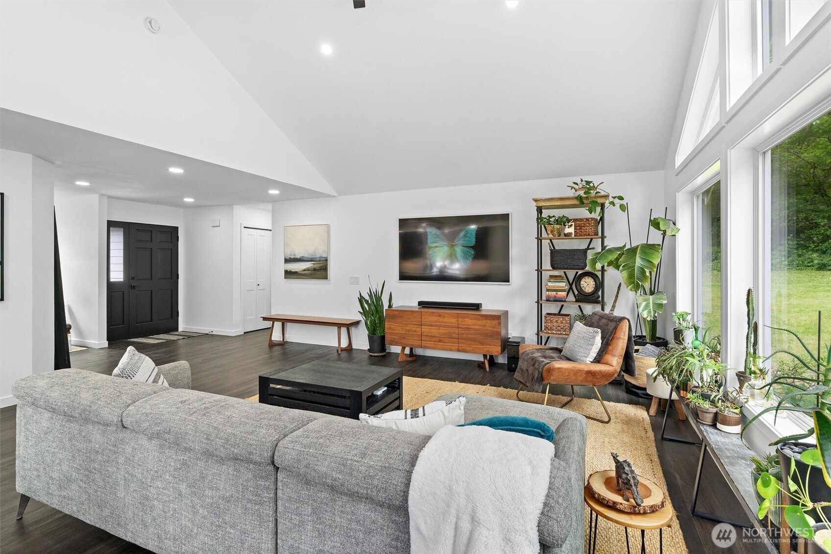 16100 Southeast 113th Place Renton, WA 98059 - Photo 8 of 40 a living room with furniture and a flat screen tv
