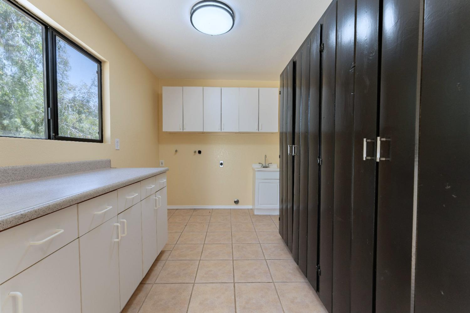 47517 Road 200 O'Neals, CA 93645 - Photo 17 of 54 a view of kitchen with stainless steel appliances granite countertop cabinets and window