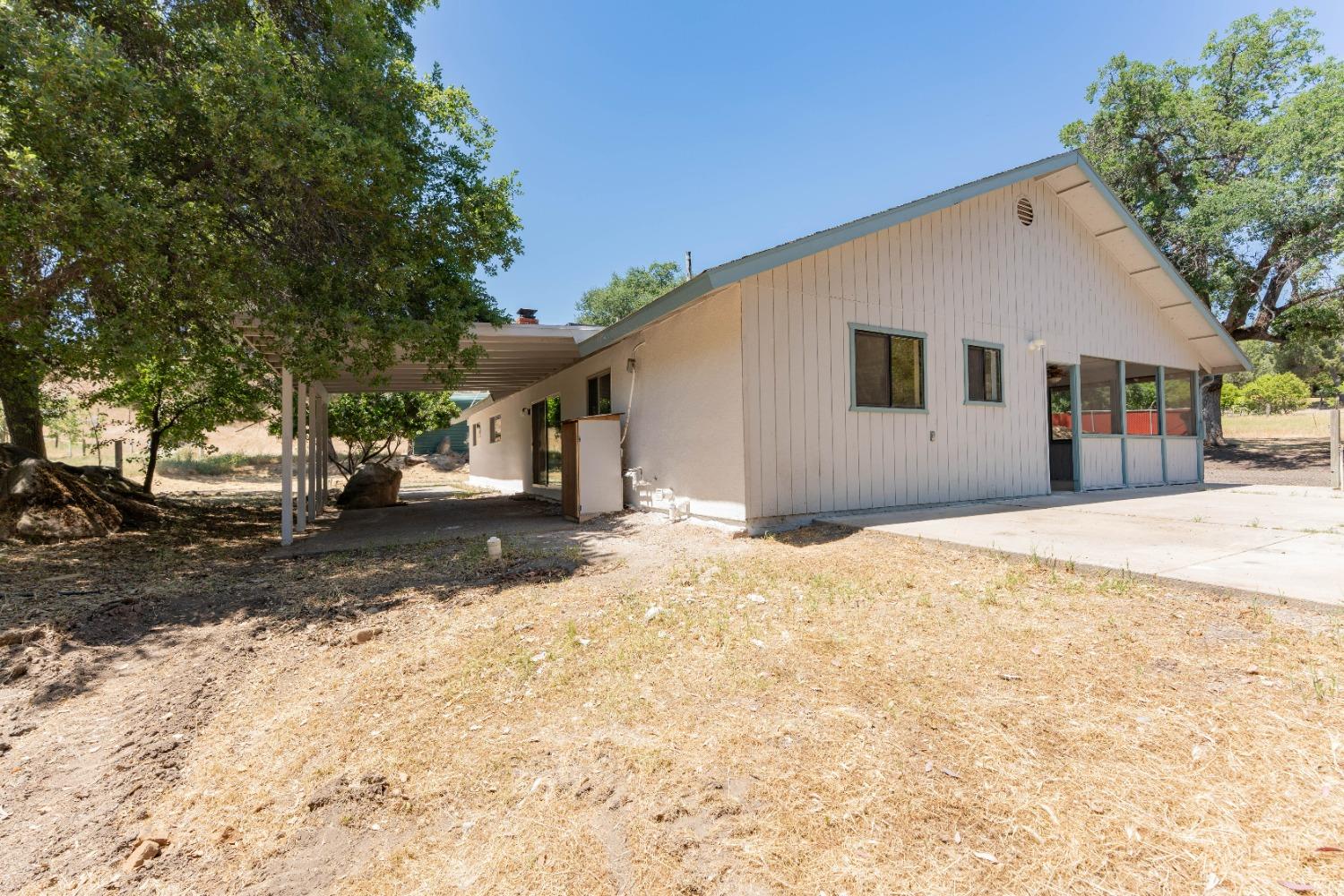 47517 Road 200 O'Neals, CA 93645 - Photo 2 of 54 a view of a house with snow on the road