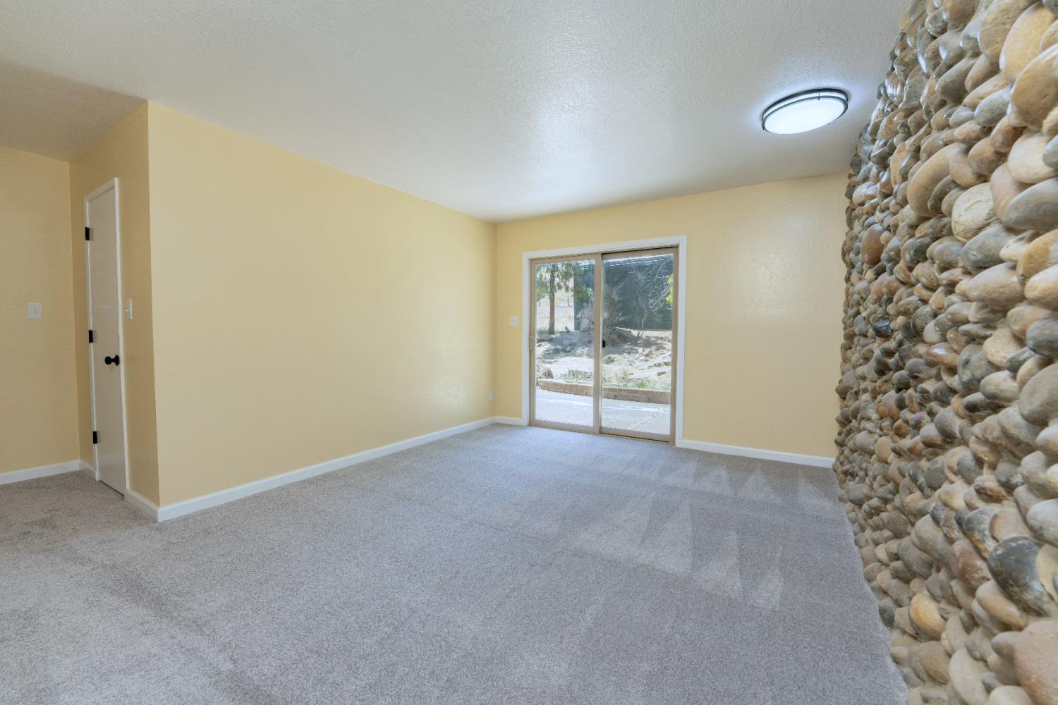 47517 Road 200 O'Neals, CA 93645 - Photo 22 of 54 a view of an empty room with a window