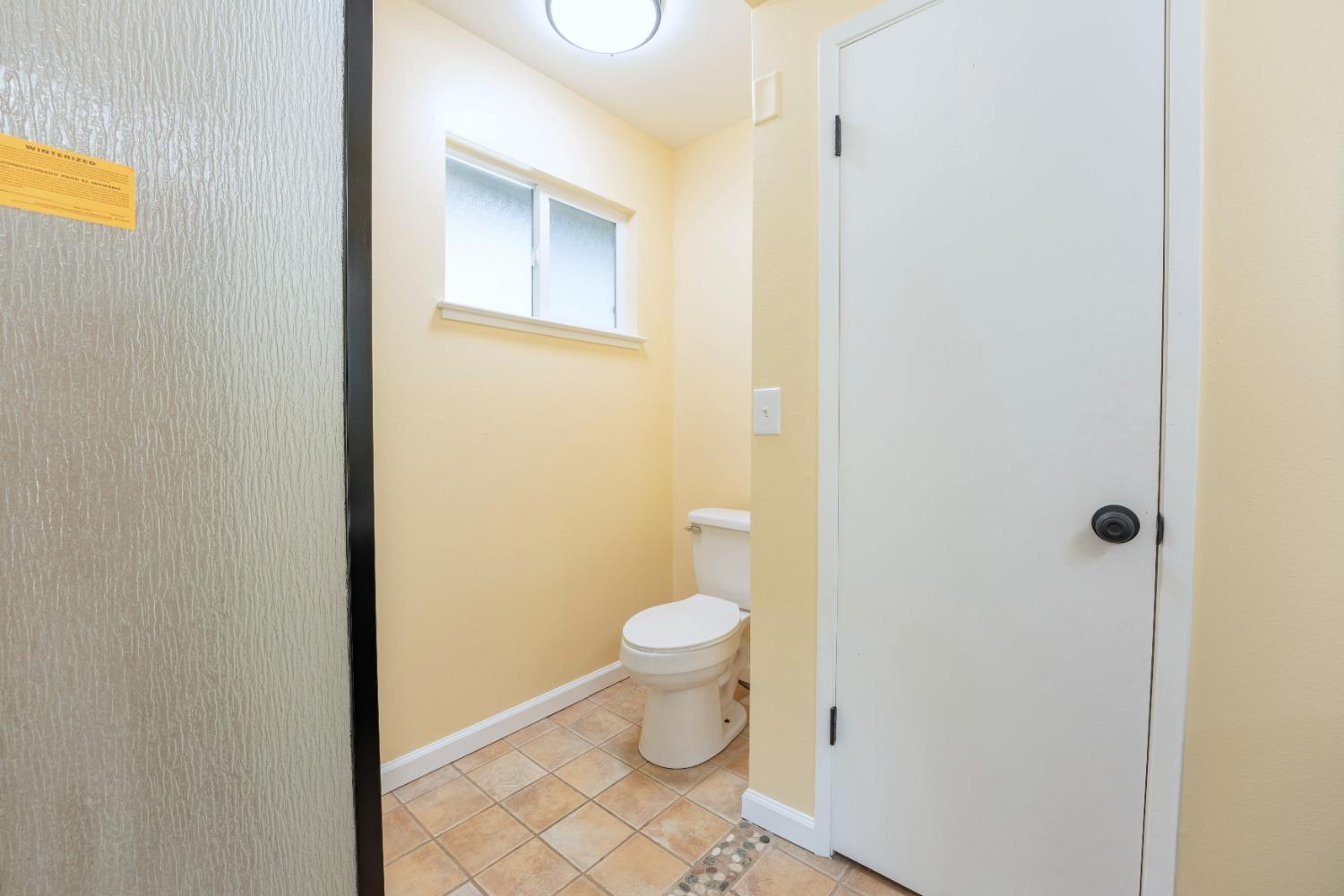 47517 Road 200 O'Neals, CA 93645 - Photo 26 of 54 a bathroom with a toilet and a sink