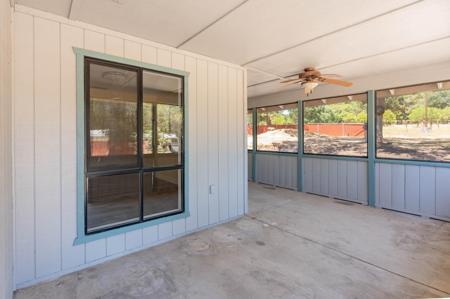 47517 Road 200 O'Neals, CA 93645 - Photo 34 of 54 an empty room with wooden floor and windows