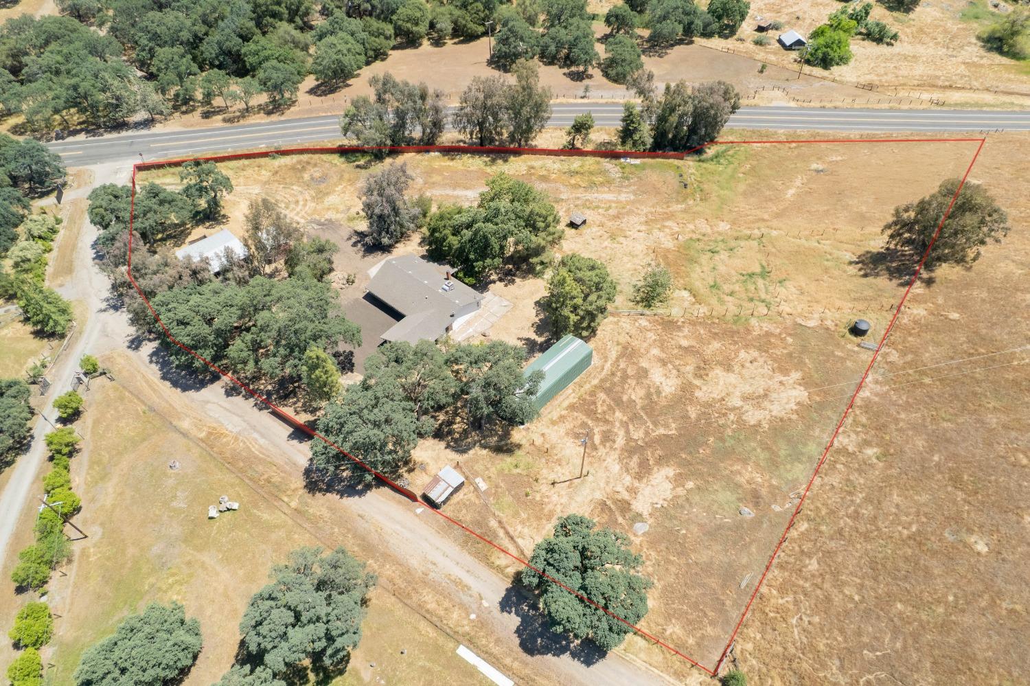 47517 Road 200 O'Neals, CA 93645 - Photo 51 of 54 a view of a yard with plants and wooden fence