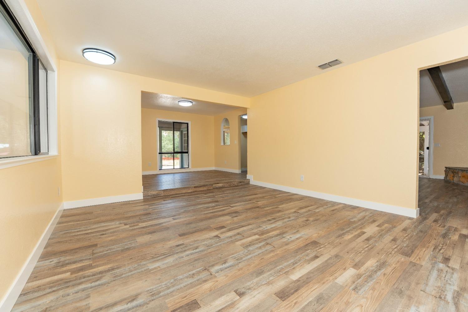 47517 Road 200 O'Neals, CA 93645 - Photo 6 of 54 a view of livingroom with hardwood floor and window