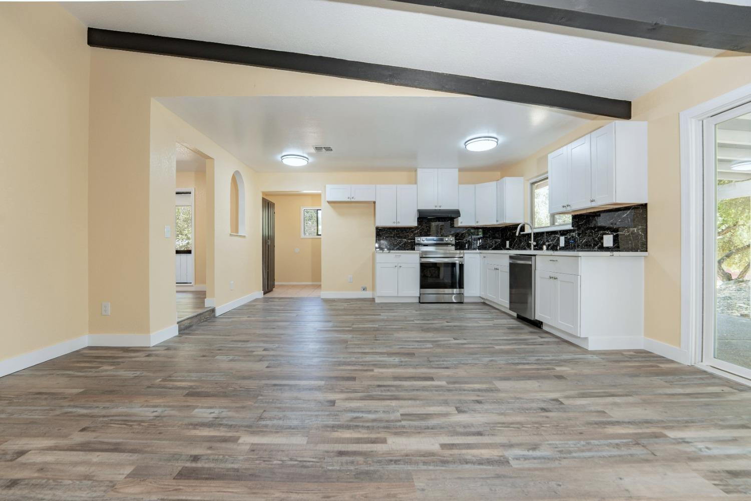 47517 Road 200 O'Neals, CA 93645 - Photo 9 of 54 a view of a kitchen with a sink stainless steel appliances and cabinets