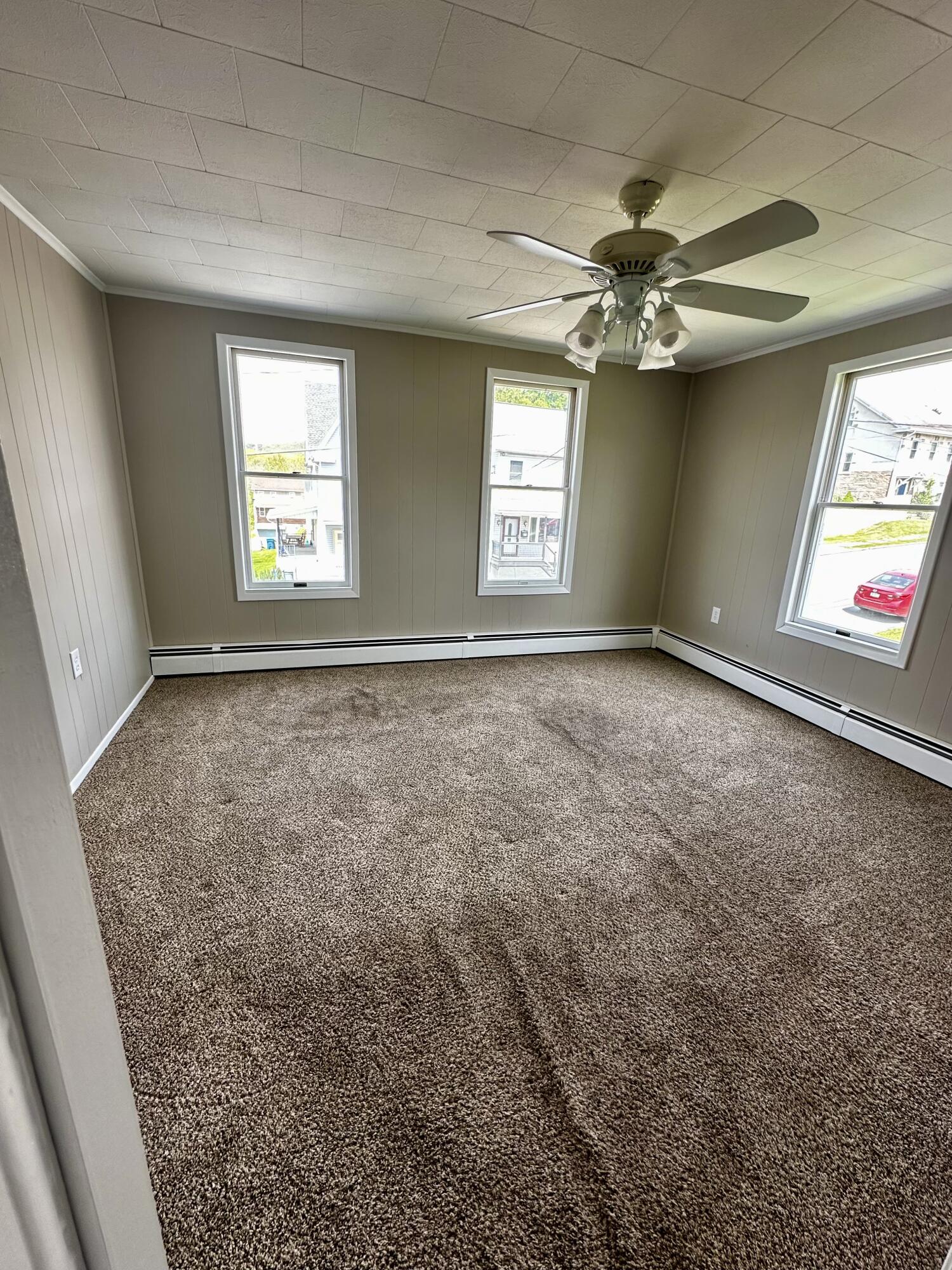 320 North Street Jim Thorpe, PA 18229 - Photo 10 of 14 an empty room with windows and fan