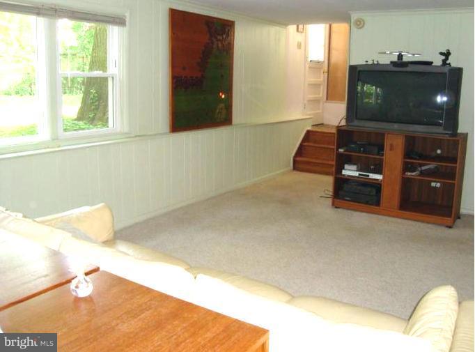 221 Rickswood Road Lutherville-Timonium, MD 21093 - Photo 13 of 30 Family room - new windows 2010, stairs to kitchen