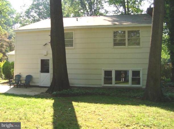 221 Rickswood Road Lutherville-Timonium, MD 21093 - Photo 18 of 30 Back yard - tree shaded patio off the kitchen