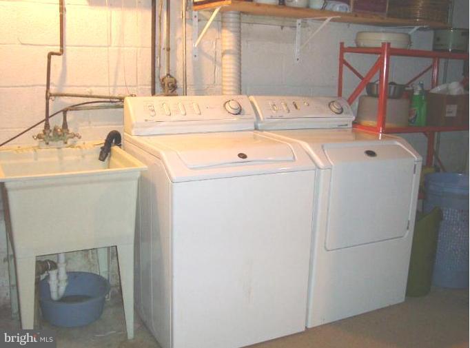 221 Rickswood Road Lutherville-Timonium, MD 21093 - Photo 21 of 30 Washer & Dryer plus soaking tub in utility room