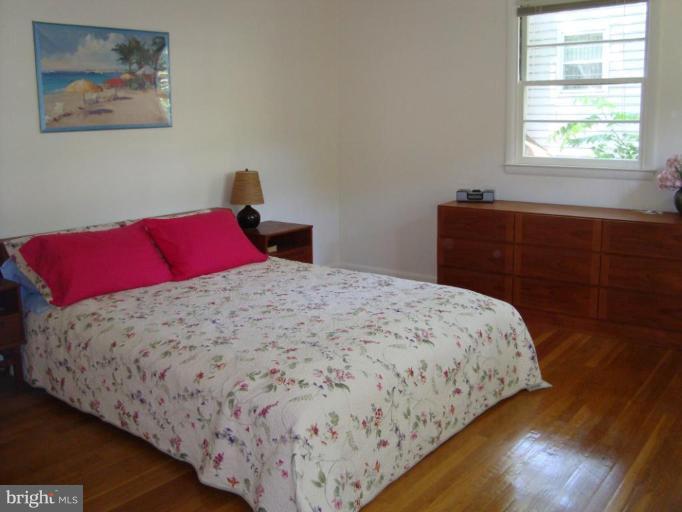 221 Rickswood Road Lutherville-Timonium, MD 21093 - Photo 7 of 30 Wood floors and mini blinds throughout