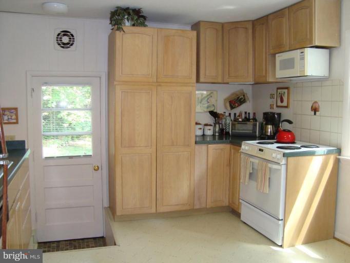 221 Rickswood Road Lutherville-Timonium, MD 21093 - Photo 10 of 30 View from dining room towards back door