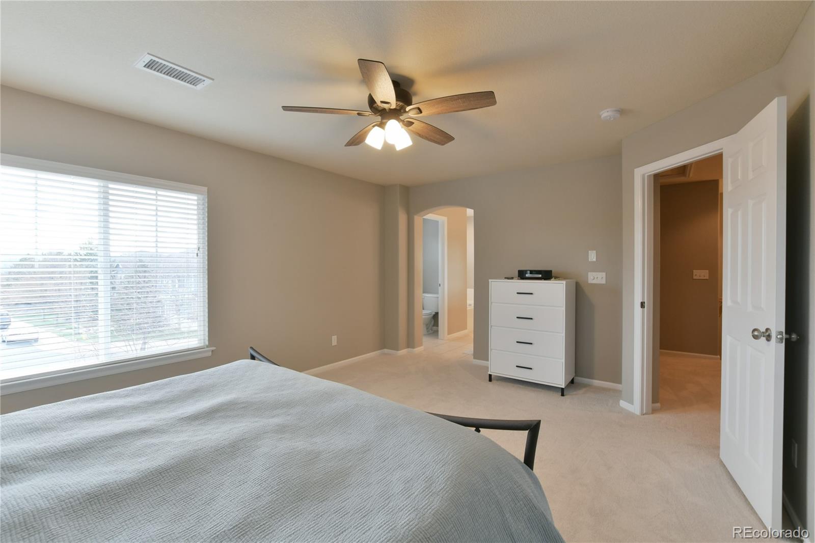 156 Whitehaven Circle Highlands Ranch, CO 80129 - Photo 21 of 30 a view of an empty room with a window